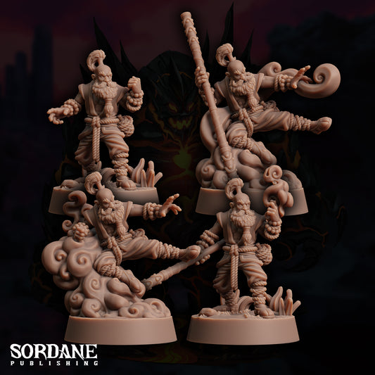 a couple of figurines that are on a table
