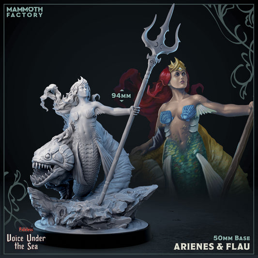a statue of a mermaid and a mermaid holding a spear