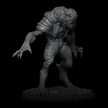 a statue of a creature on a black background