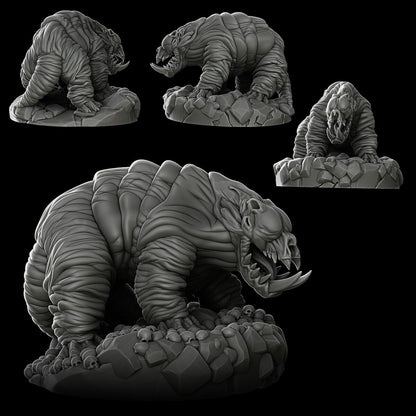 a black and white photo of a plastic model of a dinosaur