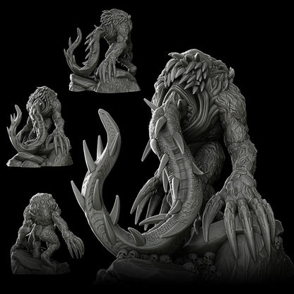 a statue of a creature with a demon face