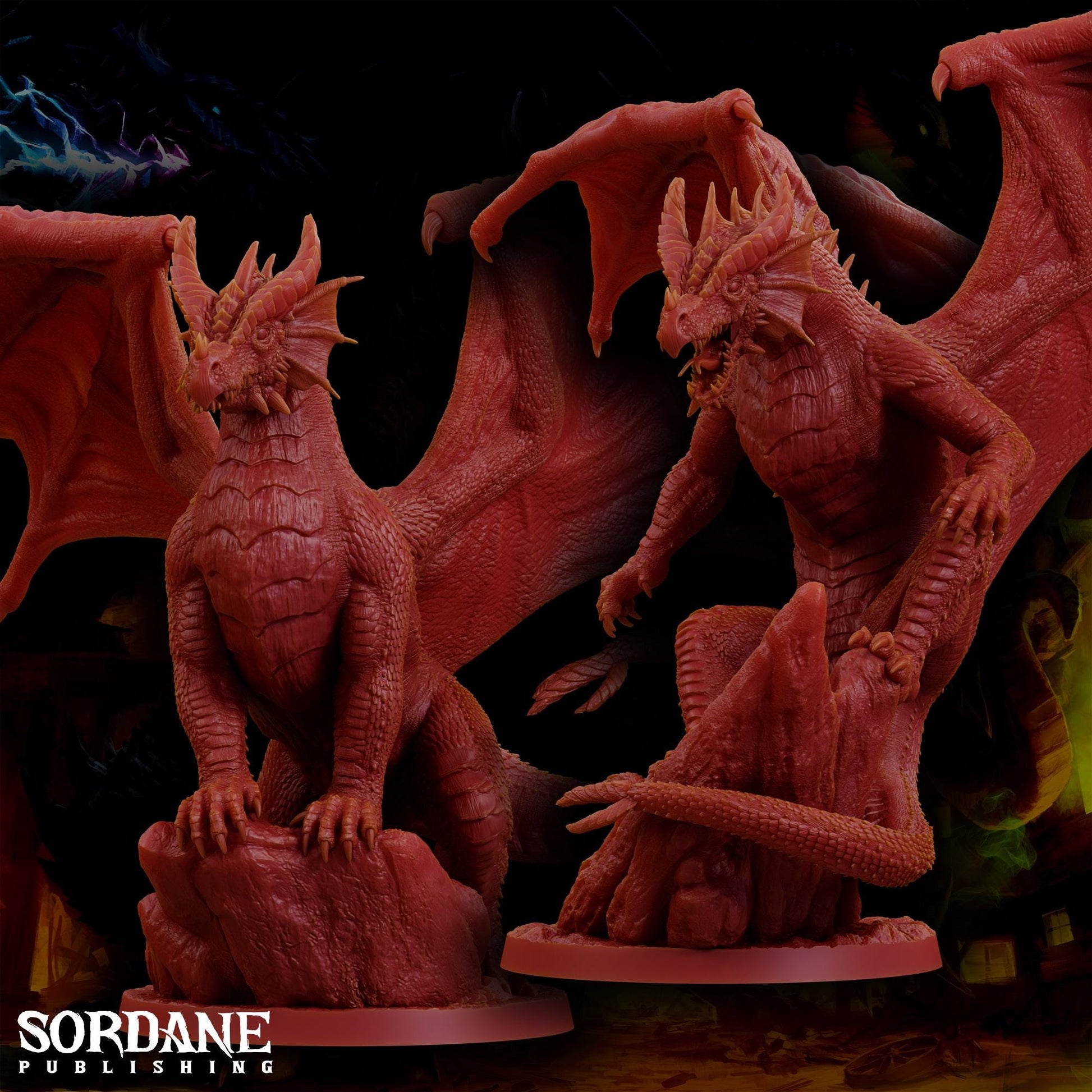 a couple of red dragon figurines sitting on top of a table