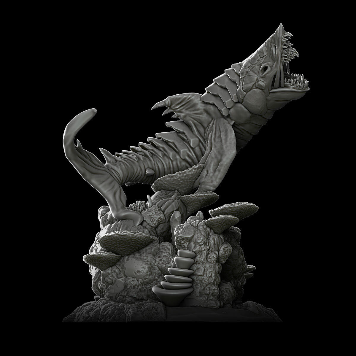 a black and white photo of a statue of a fish