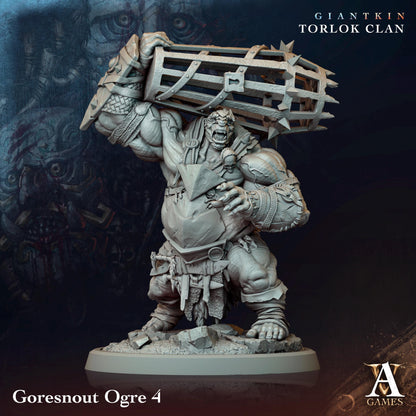 a statue of a man carrying a crate on his head