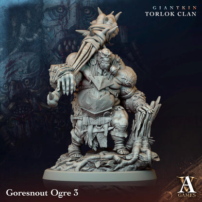 a statue of a demon holding a sword
